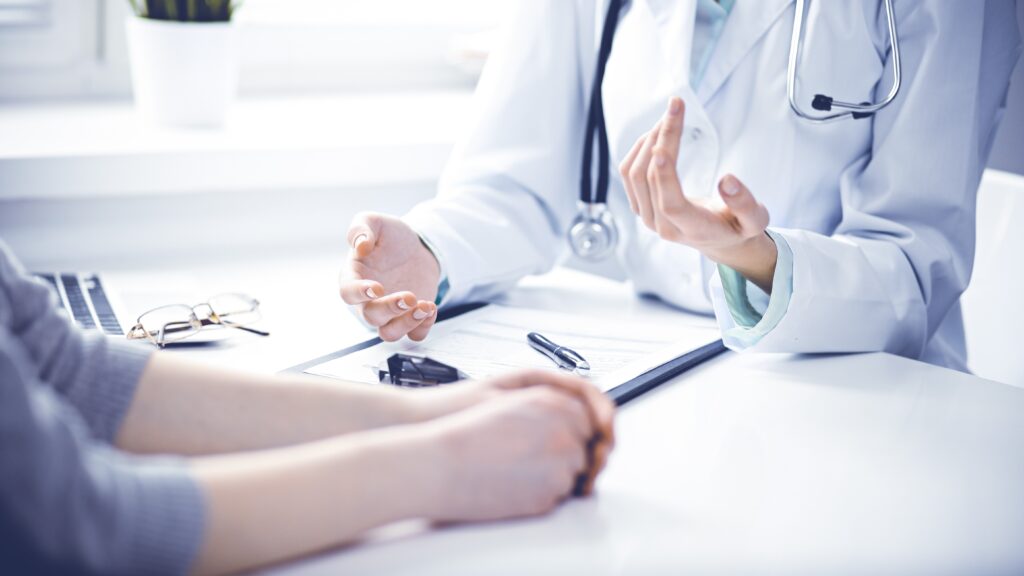 Close up of a doctor and patient consultation