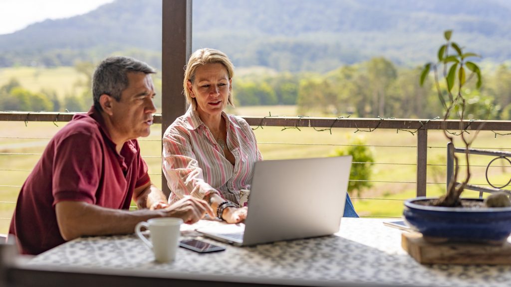 Couple sharing a laptop