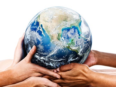 hands supporting a globe