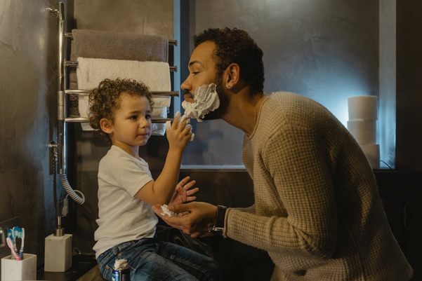 Father and son shaving