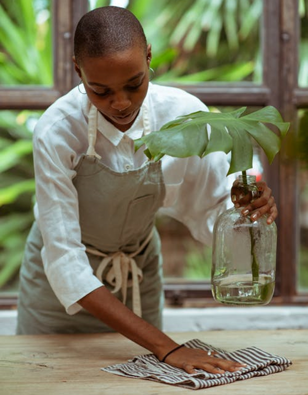 Waitress with a plant
