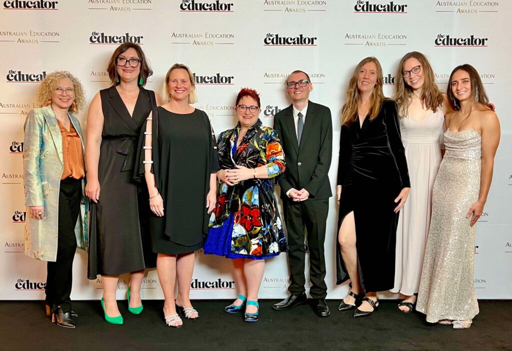 C4IE research team and ARC Linkage partner school leaders smiling while taking a picture at the Australian Education Awards 2024.