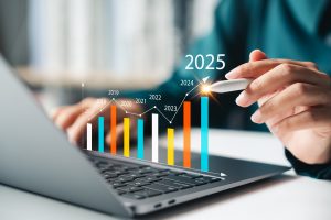 a bar chart animation over a laptop