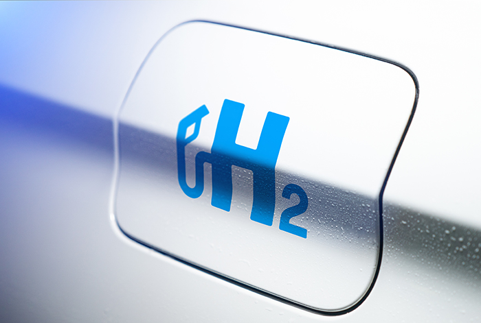 Hydrogen logo on vehicle filler cap
