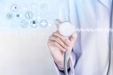 abstract health image with doctor holding a stethoscope