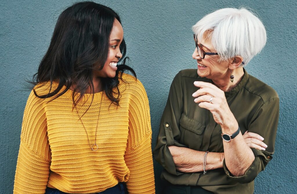 Two women sitting together
