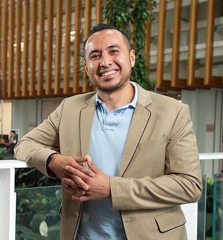 Headshot of Dr Adi Idris