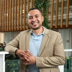 Headshot of Dr Adi Idris