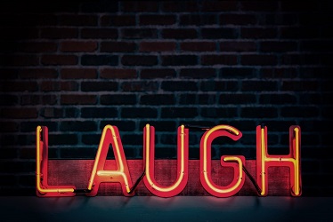 illuminated laugh sign