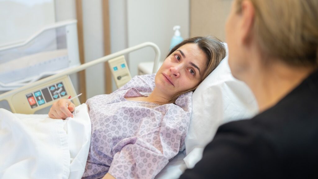 Patient with medical staff member