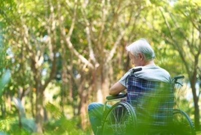 Elderly man in a wheelchair